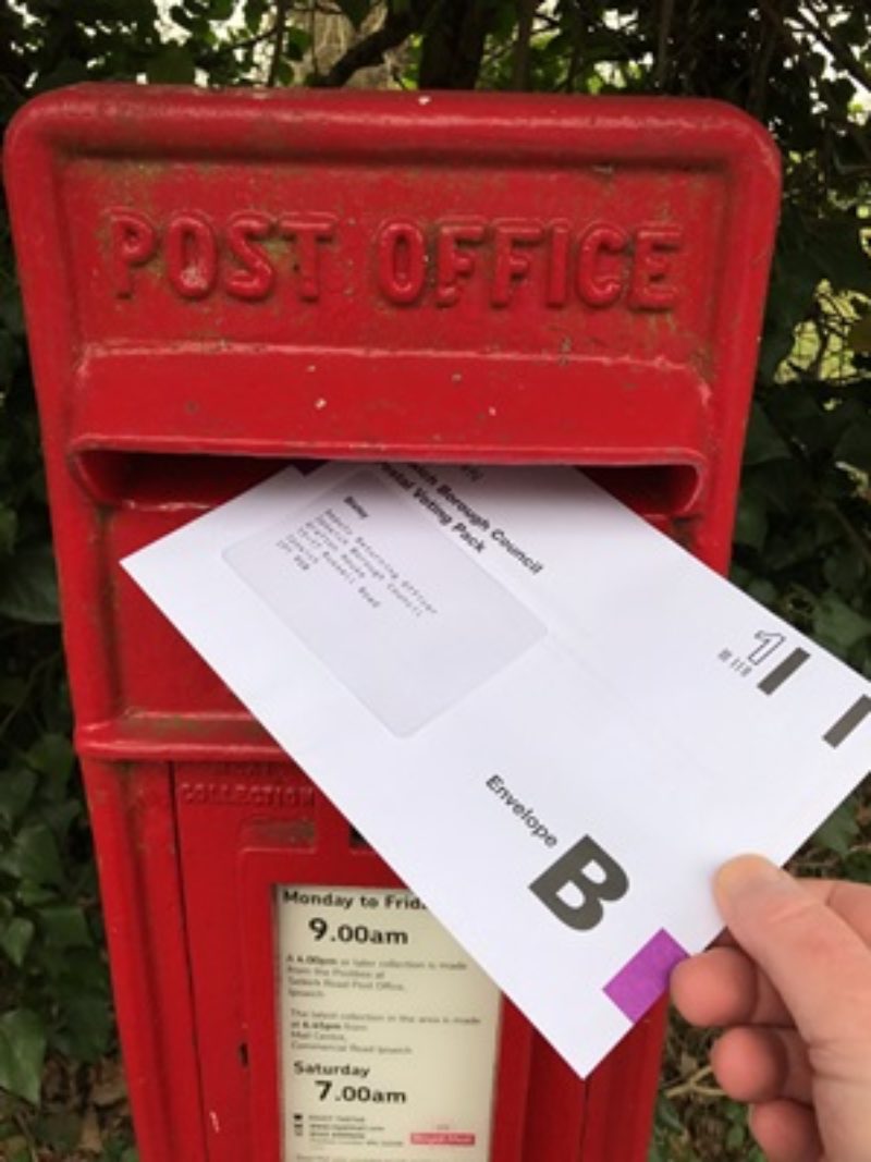 Voter Returning Postal Vote